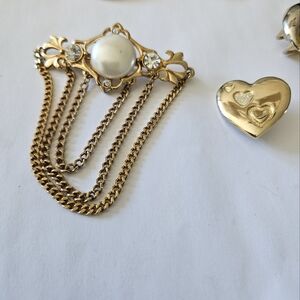 4 gold plated broches